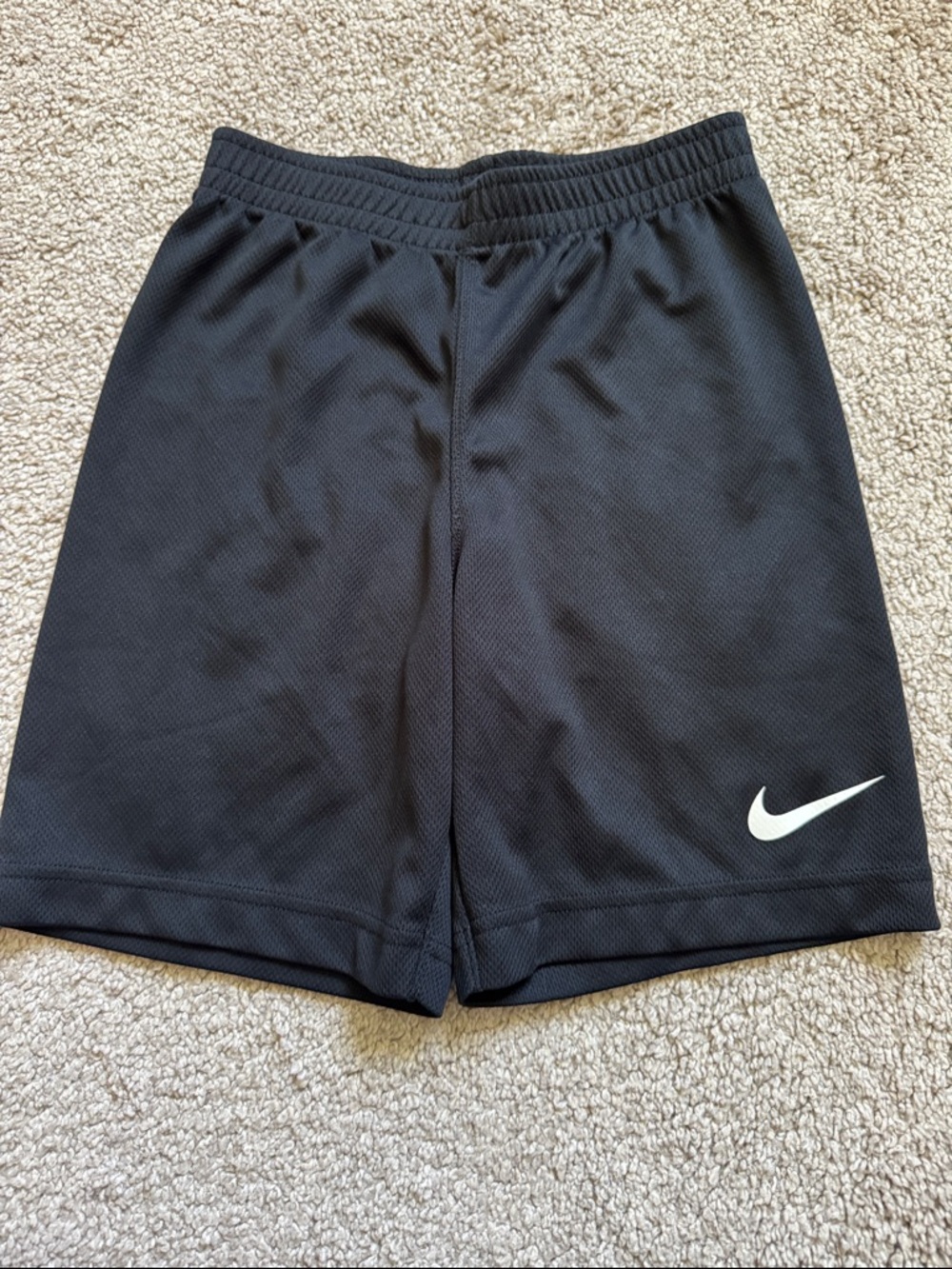 Nike Black Mesh Athletic Shorts with White Swoosh